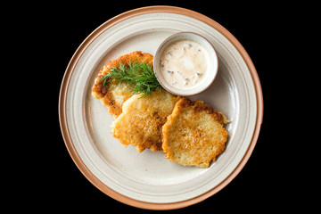 European international fusion cuisine, a beautiful dish on a white plate decorated with herbs and vegetables. a professional chef has prepared a delicious meal.