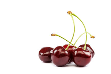 Fruits of a sweet cherry on white background.