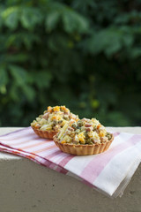 Tartlets with russian salad