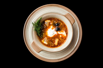 European international fusion cuisine, a beautiful dish on a white plate decorated with herbs and vegetables. a professional chef has prepared a delicious meal.