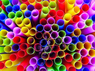 Drinking straws colorful coming together.