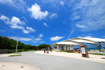 Beautiful sunny day blue sky and white cloud view with fresh green tree and grass travel in Japan Okinawa