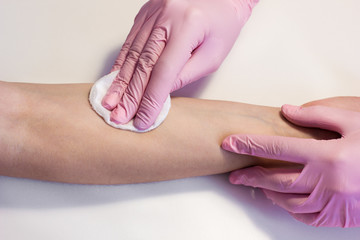 Close-up Of A Doctor Injecting Vaccine To Patient In Arm