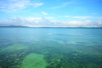 Obraz premium Beautiful sunny day blue sky and white cloud view in Japan Okinawa