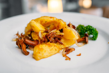 European international fusion cuisine, a beautiful dish on a white plate decorated with herbs and...
