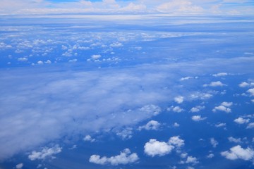 Naklejka na ściany i meble Beautiful blue sky and white cloud view from the plane