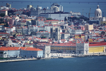 Fototapeta na wymiar Long shot of Lisbon with cathedral, pantheon, Comercio plaza and river