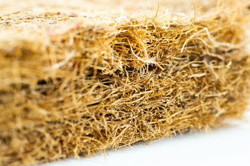 Mattress with coconut fiber. Coconut coir. Grated coconut shell for the production of mattresses. texture, natural background.