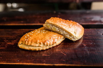 European international fusion cuisine, a beautiful dish on a white plate decorated with herbs and vegetables. a professional chef has prepared a delicious meal.