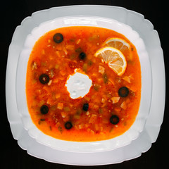 European international fusion cuisine, a beautiful dish on a white plate decorated with herbs and...
