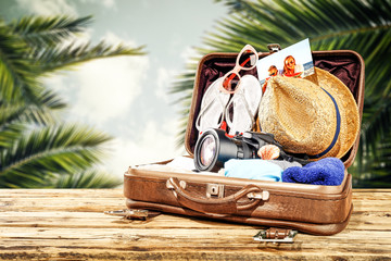 summer suitcase and photo of people 