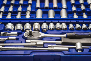 automotive tool kit chrome vanadium in a blue case on a white background
