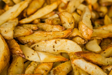 freshly baked potato wedges for catering at a corporate event