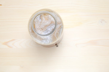 Fresh home made Kombucha fermented tea on a wooden background