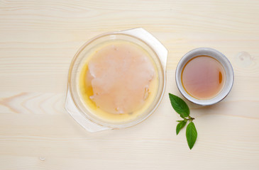 Fresh home made Kombucha fermented tea on a wooden background