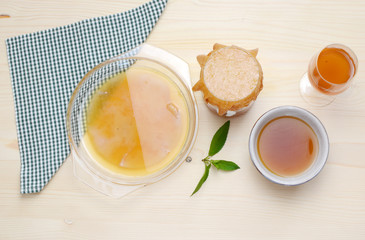 Fresh home made Kombucha fermented tea on a wooden background