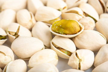 Pistachio nuts arranges as background