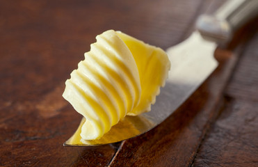 Elegant swirl or curl of fresh farm butter