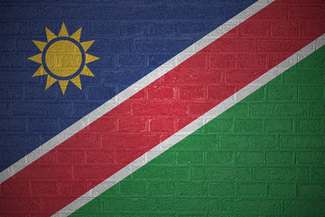 Flag of Namibia on brick wall background, 3d illustration