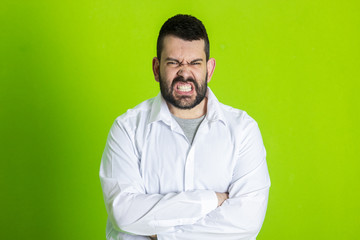 Face of an angry and furious male. The image is depicting emotions of anger and frustration