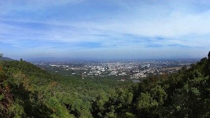 Fototapeta premium view city in valley from hill