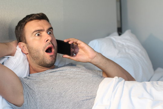 Man listening to rumours on the phone 