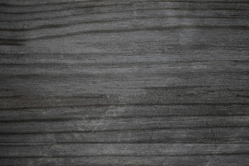 Wood texture. Dark Grey  scratched wooden cutting board. Natural Gray  Background..