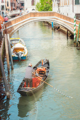 Fototapeta na wymiar Venise au fil de l'eau