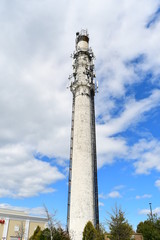 Obraz premium electric tower in the cloud and blue sky background