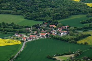 Fototapeta na wymiar Small Czech village between fields and forest