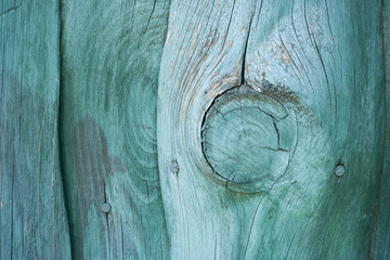 Turquoise wooden fence background. Vintage timber texture background. Rustic view.