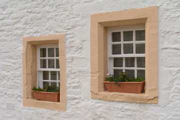 Window detail of a stone built cottage in the village of Glamis in Angus, Scotland.