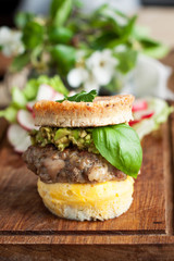 Homemade burger with eggs bun and guacamole