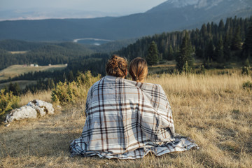 Couple Enjoying Sitting in Nature © LStockStudio