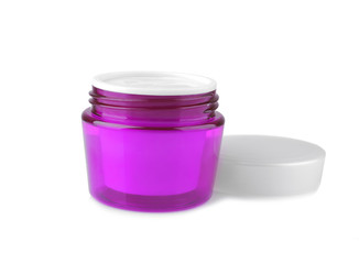 Face cream in a lavender jar with a white lid on a white background. isolated