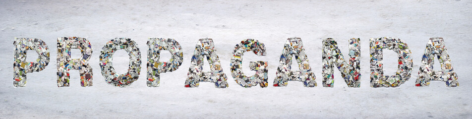 the word     PROPAGANDA made from newspaper confetti on old paper