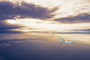 Fototapeta premium old airplane on the background of the twilight