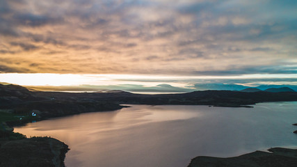drone view of lake during sunset in iceland