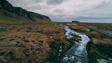 Fototapeta na wymiar aerial view of river with big cliffs in iceland