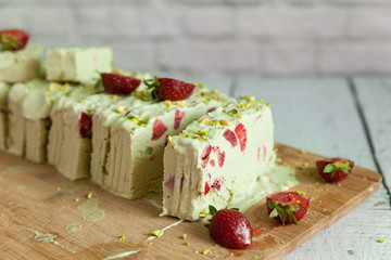 Pistachio ice cream with strawberries
