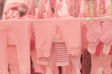 Baby Girl Clothes on drying rack