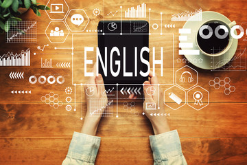 English with a person holding a tablet computer