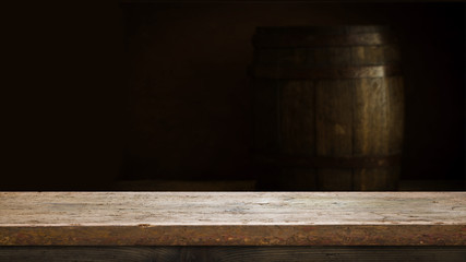 background of barrel and worn old table of wood