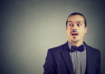 Surprised man listening to gossips