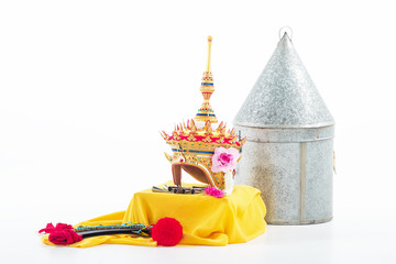The  Southern thai classical crown and accessory put on yellow cloth,on white background.prepare for use,