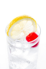 Classic Tom Collins cocktail on white background. Close up
