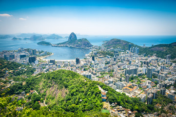 City skyline scenic overlook of Rio de Janeiro, Brazil with Sugarloaf Mountain, Botafogo and Guanabara Bay