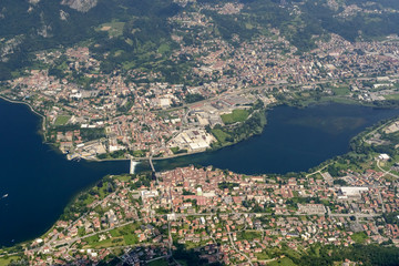 aerial of Olginate and Calolziocorte villages on Adda river , Italy