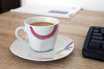 Relax in work with coffee in cup
