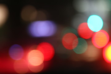 lighting red bokeh background black luxury night abstract multicolor lights, city night light blur...